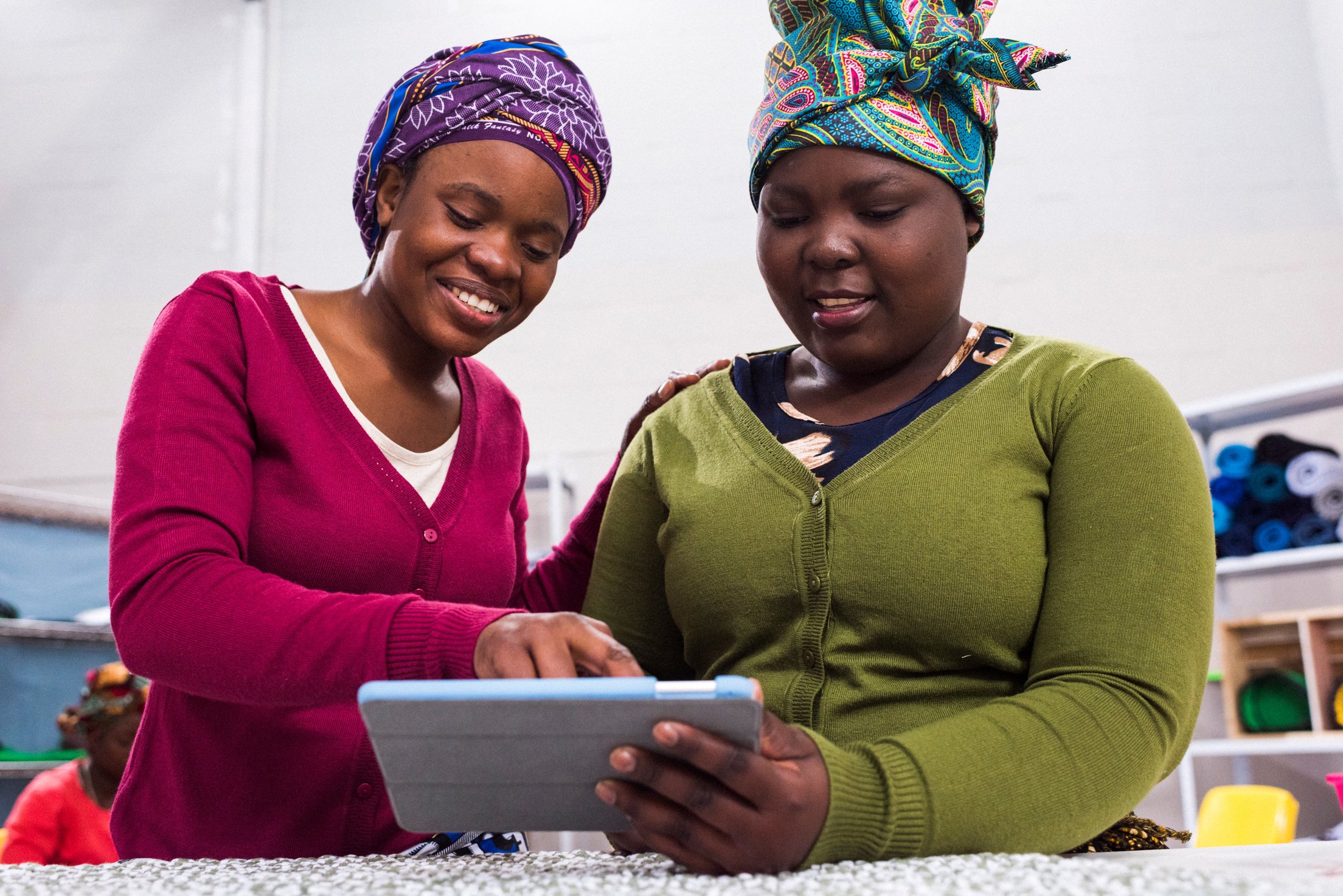 Women ordering new inventory. Business in Africa